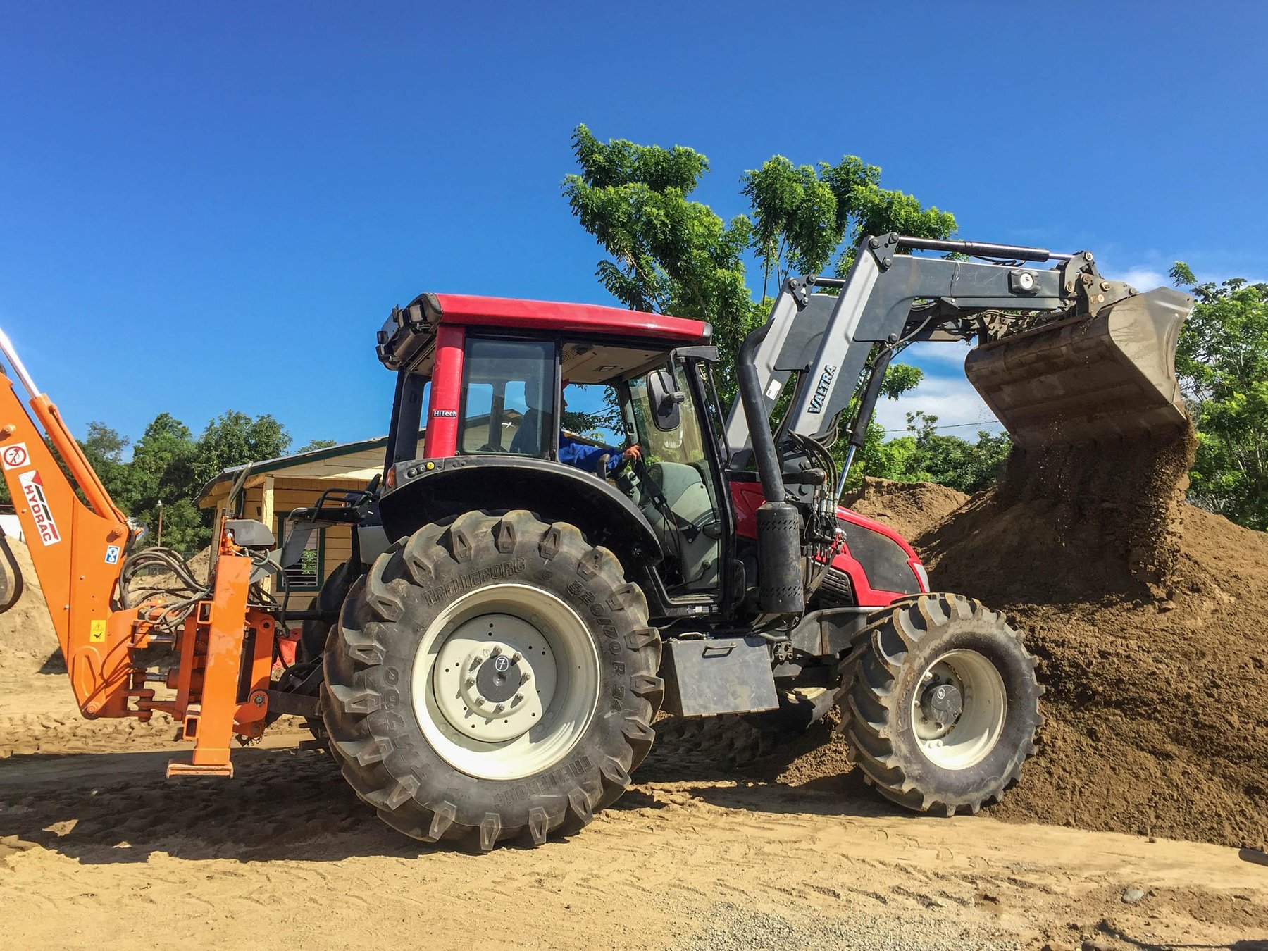 Excavator Valtra UM 355 backhoe