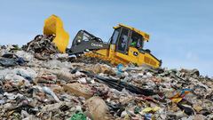 John Deere 1050J Waste Handler