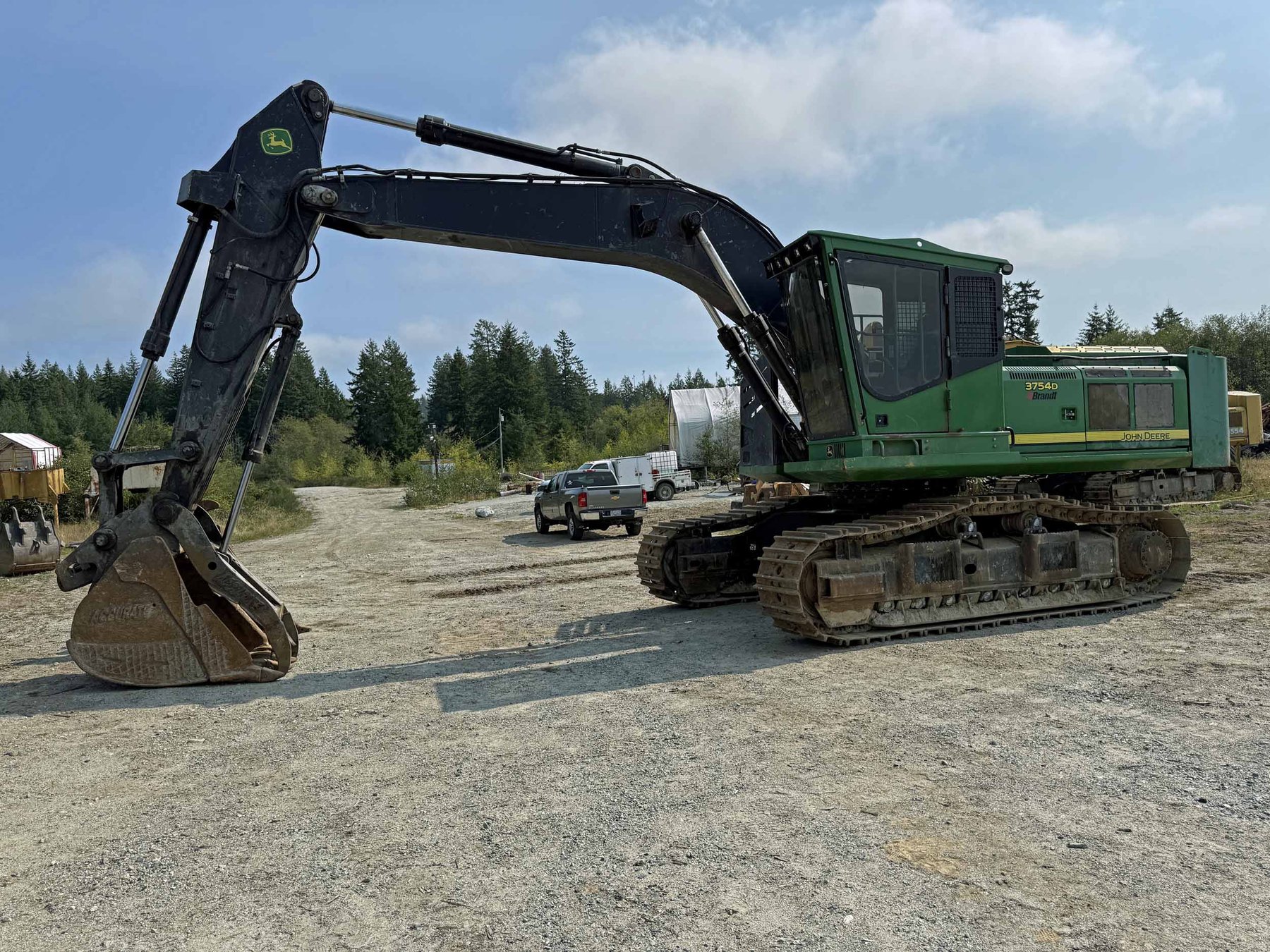 Bagger John Deere 230C LC