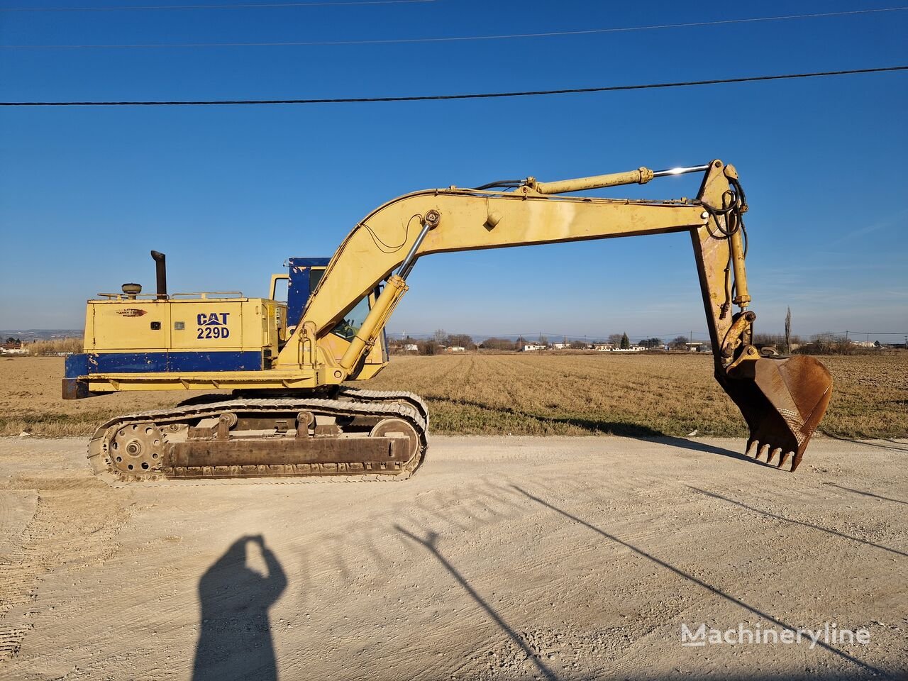 Bagger Caterpillar 229D