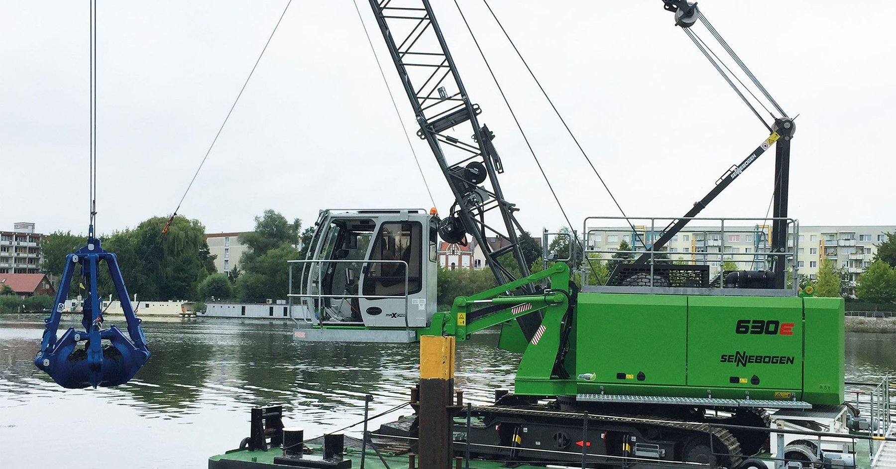 Crane Sennebogen Compact Duty Cycle Crane with 30 t load capacity for hydraulic engineering & well construction